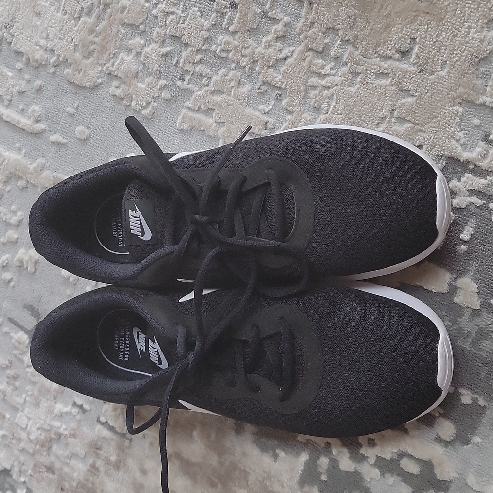 Nike size 11 Black and white comfortable shoes. Worn once like new.